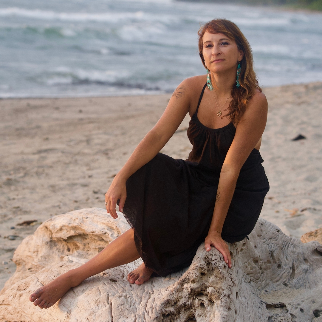 headshot of Beth Weinstein at the beach